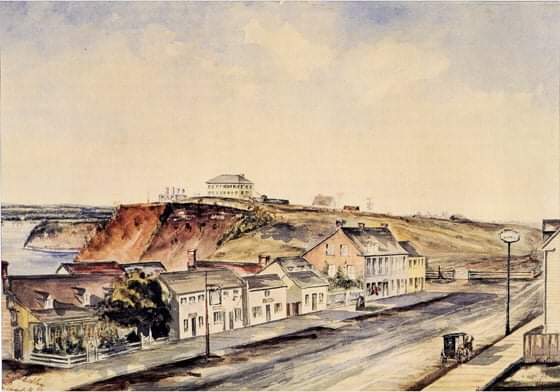 Bytown in 1853, Looking east along Wellington St. Wellington Street near Bank Street, Ottawa, 1853. Sedley's watercolour was painted from a room in Mr. Doran's hotel along Wellington street. The buildings shown on the Hill were the Military Barracks, occupied by